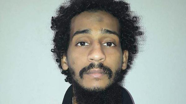 (FILES) A handout file photo provided by the Syrian Democratic Forces (SDF) on February 10, 2018 shows captured British Islamic State (IS) group fighter El Shafee Elsheikh, posing for a mugshot in an undisclosed location. - - Sputnik International