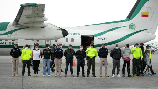 Police present to the media five persons charged with the murder of Paraguay's prosecutor of organized crime and drug trafficking cases, Marcelo Pecci, on an airport tarmac in Bogota, Colombia, Wednesday, June 8, 2022. - Sputnik International