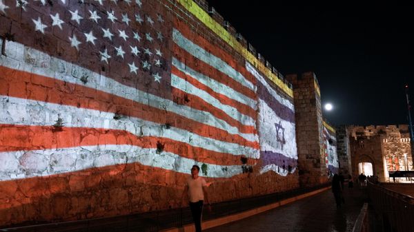 Image of the U.S. and Israeli flags is projected on the walls of Jerusalem's Old City in honor of President Joe Biden visit to Jerusalem, Wednesday, July 13, 2022. - Sputnik International