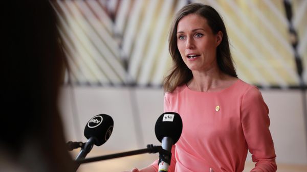 Finland's Prime Minister Sanna Marin speaks with the media as she arrives for an EU summit in Brussels, Thursday, June 23, 2022. - Sputnik International