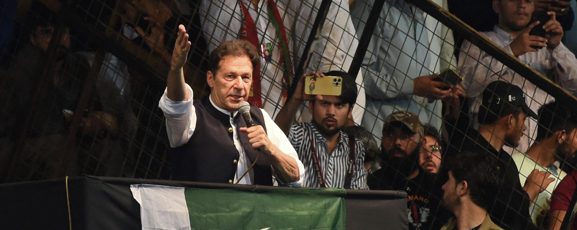 Pakistan's former Prime Minister and Pakistan Tehreek-e-Insaf party (PTI) chief Imran Khan, delivers a speech to his supporters during a rally celebrate the 75th anniversary of Pakistan's independence day in Lahore on August 13, 2022. Pakistan's former Prime Minister and Pakistan Tehreek-e-Insaf party (PTI) chief Imran Khan, delivers a speech to his supporters during a rally celebrate the 75th anniversary of Pakistan's independence day in Lahore on August 13, 2022. - Sputnik International, 1920, 25.08.2022