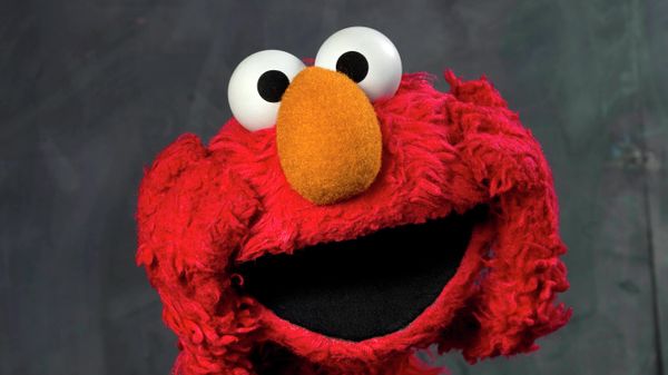 FILE - This Jan. 24, 2011, photo shows Sesame Street muppet Elmo posing for a portrait with the assistance of puppeteer Kevin Clash in the Fender Music Lodge during the 2011 Sundance Film Festival to promote the documentary Being Elmo in Park City, Utah. Elmo got a COVID-19 vaccine Tuesday, June 28, 2022, according to Sesame Workshop, the nonprofit educational organization behind “Sesame Street.  - Sputnik International