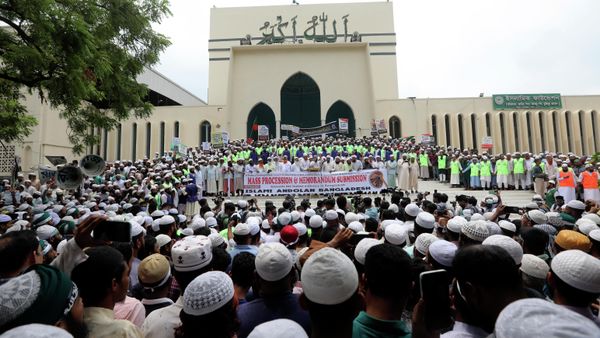 Muslims shout slogans against Nupur Sharma, a spokesperson of India's governing Hindu nationalist Bharatiya Janata Party, as they react to the derogatory references to Islam and the Prophet Muhammad made by her, during a protest outside a mosque in Dhaka, Bangladesh, Thursday, June 16, 2022. Thousands of people marched in Bangladesh’s capital on Thursday to demand the governments of Bangladesh and India officially condemn the comments by two Indian governing party officials deemed derogatory to Islam’s Prophet Muhammad.  - Sputnik International