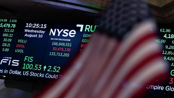 FILE - A screen displays market data at the New York Stock Exchange in New York, Wednesday, Aug. 10, 2022. Wall Street’s big gains this summer have been spread widely across industries. The profit growth underpinning those gains? Not so much. (AP Photo/Seth Wenig, File) - Sputnik International