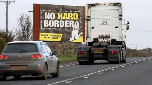 Traffic passes an No Hard Border anti-Brexit, pro-Irish unity billboard poster as it crosses the border road between Newry in Northern Ireland, on February 1, 2020, and Dundalk in Ireland
 - Sputnik International