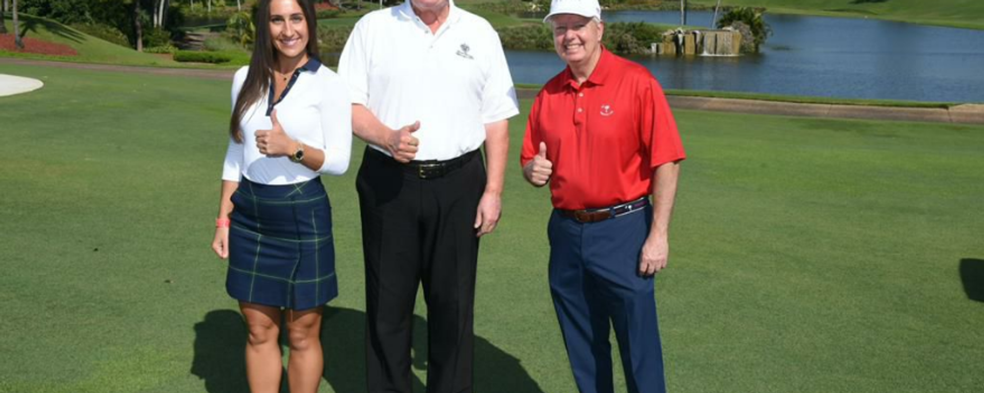Inna Yashchyshyn poses with former President Donald Trump and Sen. Lindsey Graham, R-S.C., at Mr. Trump’s private golf course just miles from Mar-a-Lago in May 2021. Inna Yashchyshyn poses with former President Donald Trump and Sen. Lindsey Graham, R-S.C., at Mr. Trump’s private golf course just miles from Mar-a-Lago in May 2021. - Sputnik International, 1920, 27.08.2022
