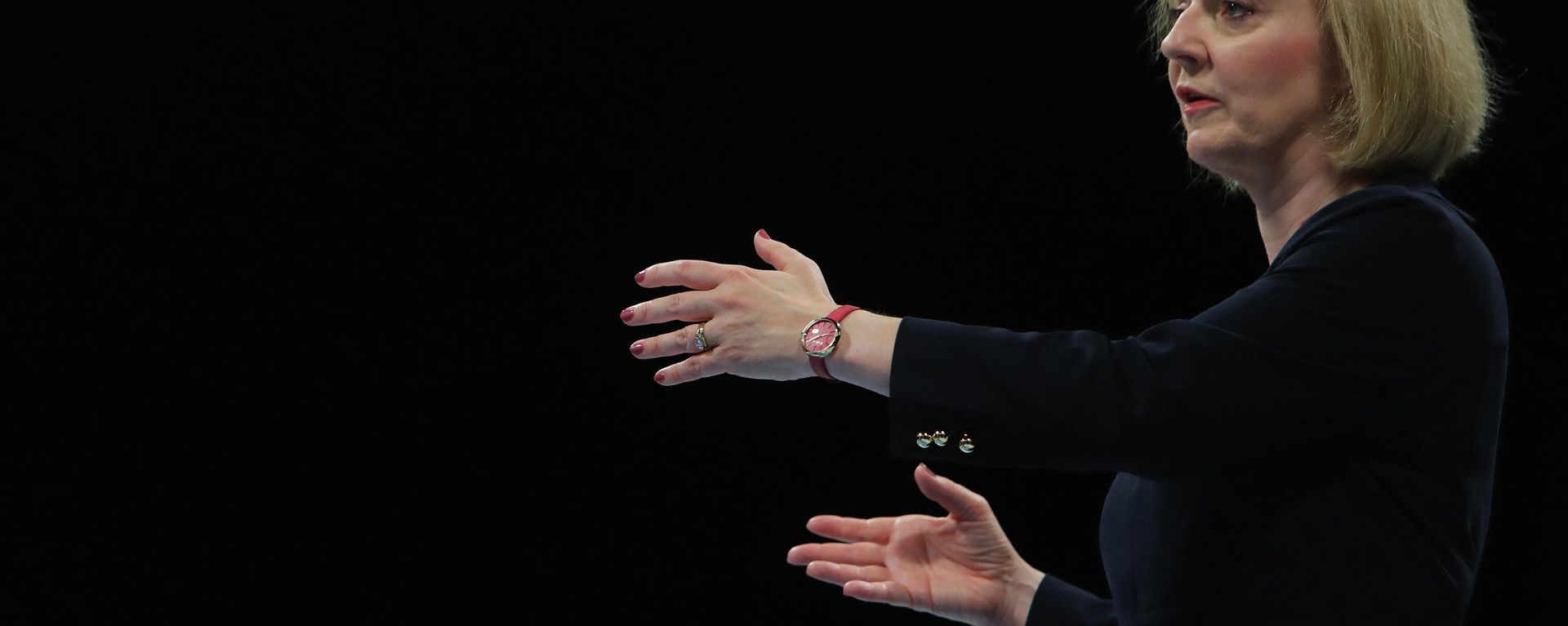 Contender to become the country's next Prime minister and leader of the Conservative party British Foreign Secretary Liz Truss reacts as she answers questions while taking part in a Conservative Party Hustings event in Birmingham, on August 23, 2022 - Sputnik International, 1920, 07.09.2022