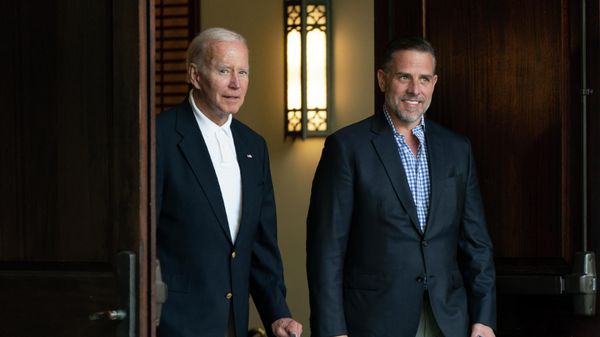 President Joe Biden and his son Hunter Biden leave Holy Spirit Catholic Church in Johns Island, S.C., after attending a Mass, Saturday, Aug. 13, 2022. - Sputnik International