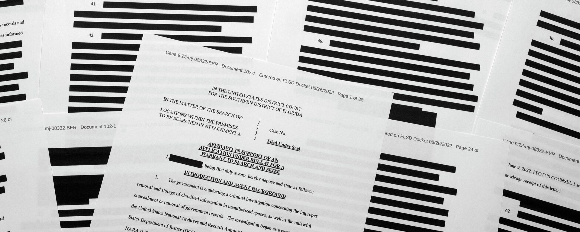 Pages from the affidavit by the FBI in support of obtaining a search warrant for former President Donald Trump's Mar-a-Lago estate are photographed Friday, Aug. 26, 2022.  - Sputnik International, 1920, 09.06.2023