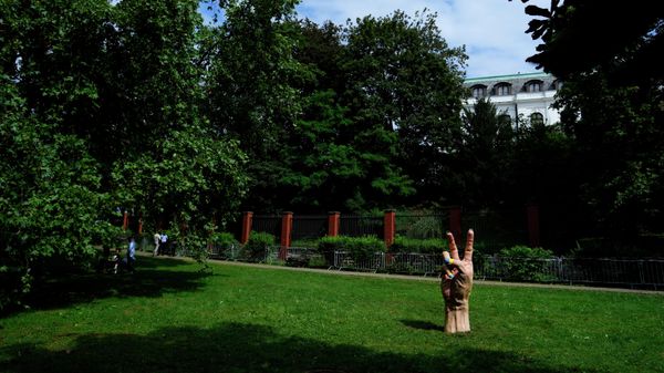 A statue of a hand with finger nails painted in Ukraine's national colors was placed in front of the Russian embassy in Prague, Czech Republic, Wednesday, Aug. 24, 2022. - Sputnik International