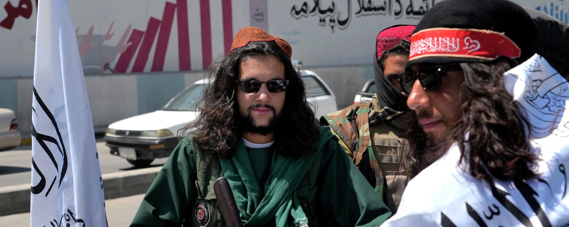 Taliban fighters celebrate the first anniversary of the withdrawal of US-led troops from Afghanistan, in front of the U.S. Embassy in Kabul, Afghanistan, Wednesday, Aug. 31, 2022 Taliban fighters celebrate the first anniversary of the withdrawal of US-led troops from Afghanistan, in front of the U.S. Embassy in Kabul, Afghanistan, Wednesday, Aug. 31, 2022 - Sputnik International, 1920, 31.08.2022
