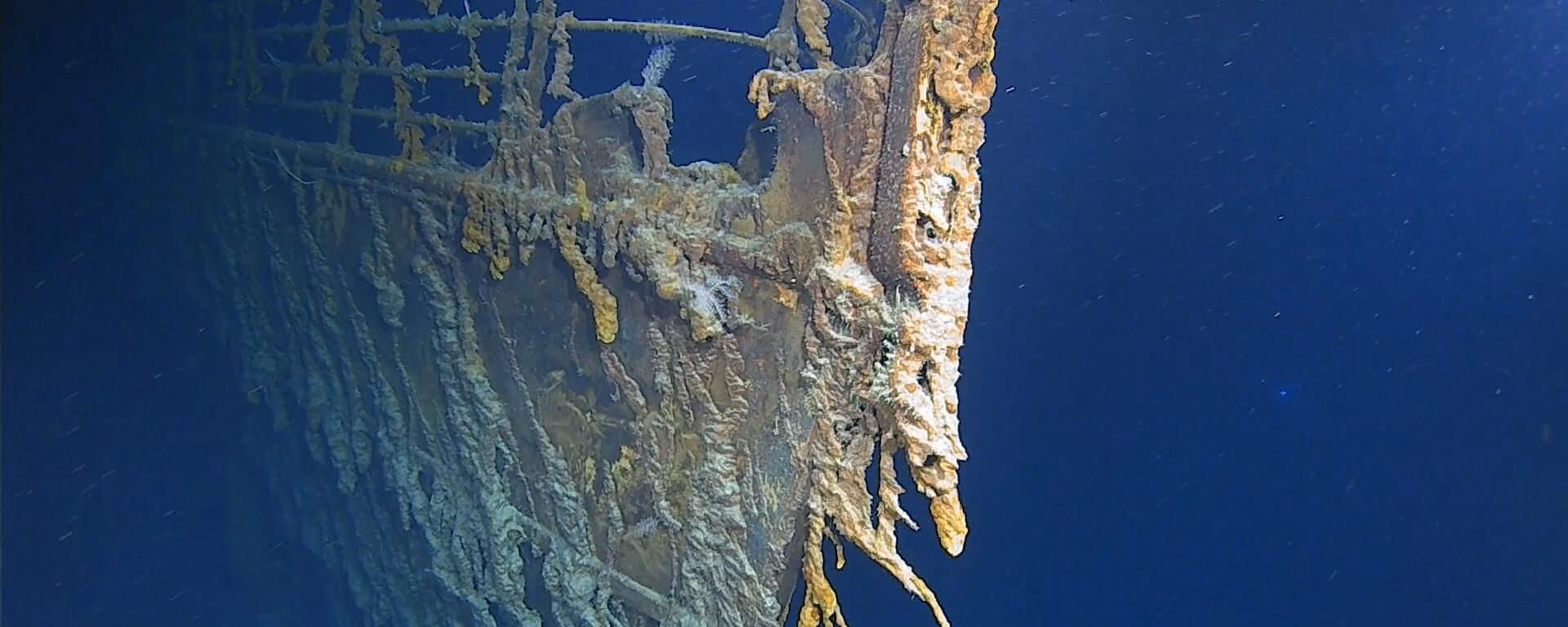 This August 2019 photo courtesy of Atlantic Productions shows the latest image of the bow of RMS Titanic which rests 12,500 feet (3,810 meters) below the Atlantic Ocean, and 370 miles (595kms) south of Newfoundland, Canada. This August 2019 photo courtesy of Atlantic Productions shows the latest image of the bow of RMS Titanic which rests 12,500 feet (3,810 meters) below the Atlantic Ocean, and 370 miles (595kms) south of Newfoundland, Canada. - Sputnik International, 1920, 01.09.2022
