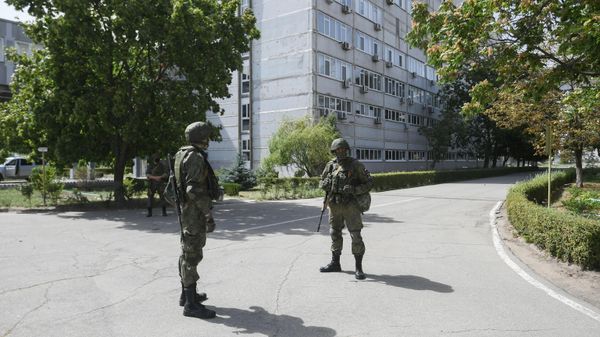 Russian servicemen are seen on the territory of the Zaporozhye nuclear power plant, as Russia's military operation in Ukraine continues, in Energodar, Zaporizhzhia region, Ukraine - Sputnik International