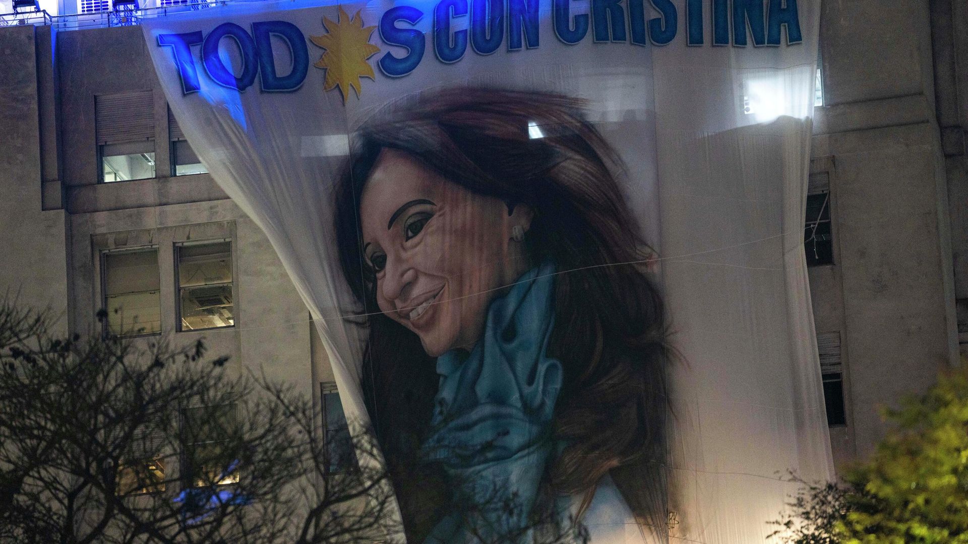 A flag with the portrait of Argentina's Vice President, Cristina Fernandez, hangs from a government building early Friday, Sept. 2, 2022, some hours after a person pointed a gun at her during an event in front of her home in the Recoleta neighborhood of Buenos Aires, Argentina. A flag with the portrait of Argentina's Vice President, Cristina Fernandez, hangs from a government building early Friday, Sept. 2, 2022, some hours after a person pointed a gun at her during an event in front of her home in the Recoleta neighborhood of Buenos Aires, Argentina. - Sputnik International, 1920, 02.09.2022