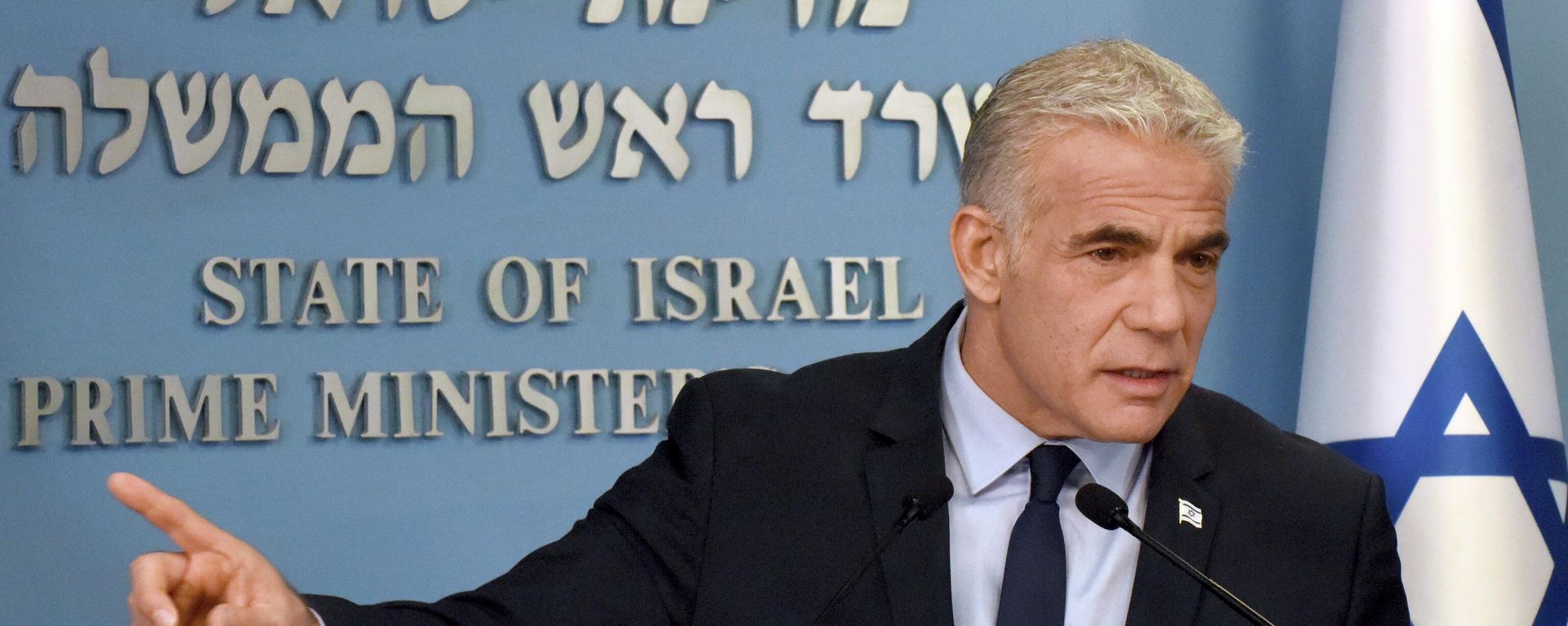 Israeli Prime Minister Yair Lapid speaks about Iran at a security briefing for the foreign press at the Prime Minister's office in Jerusalem, Wednesday, Aug. 24, 2022. Lapid called on U.S. President Joe Biden and Western powers to call off an emerging nuclear deal with Iran, saying an agreement would fail to prevent Iran from developing a nuclear bomb and reward it with billions of dollars to fund Israel's enemies. Israel's caretaker prime minister used stark language on Wednesday in his criticism of the expected agreement. (Debbie Hill/Pool via AP) - Sputnik International, 1920, 22.09.2022