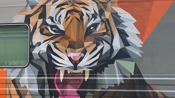 Director of the Roscongress Foundation Alexander Stuglev, Minister of Justice Konstantin Chuichenko and General Director of Russian Railways Oleg Belozerov launched the first striped train on Monday, featuring paintings of tigers. September 5, 2022. Director of the Roscongress Foundation Alexander Stuglev, Minister of Justice Konstantin Chuichenko and General Director of Russian Railways Oleg Belozerov launched the first striped train on Monday, featuring paintings of tigers. September 5, 2022. - Sputnik International