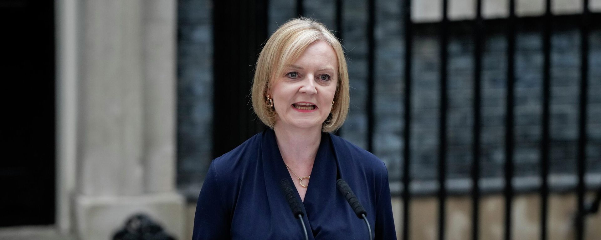 New British Prime Minister Liz Truss makes an address outside Downing Street in London, Tuesday, Sept. 6, 2022 after returning from Balmoral in Scotland where she was formally appointed by Britain's Queen Elizabeth II. New British Prime Minister Liz Truss makes an address outside Downing Street in London, Tuesday, Sept. 6, 2022 after returning from Balmoral in Scotland where she was formally appointed by Britain's Queen Elizabeth II. - Sputnik International, 1920, 08.09.2022