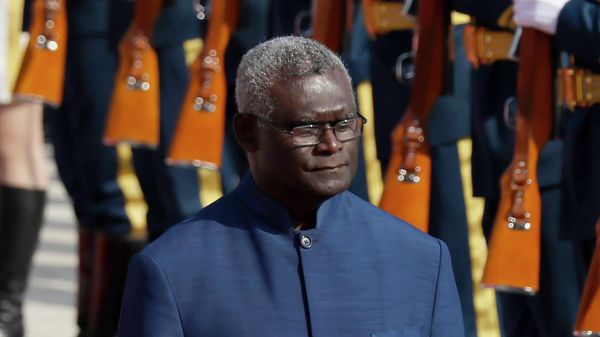 FILE - Solomon Islands Prime Minister Manasseh Sogavare reviews an honor guard during a welcome ceremony at the Great Hall of the People in Beijing, on Oct. 9, 2019 - Sputnik International
