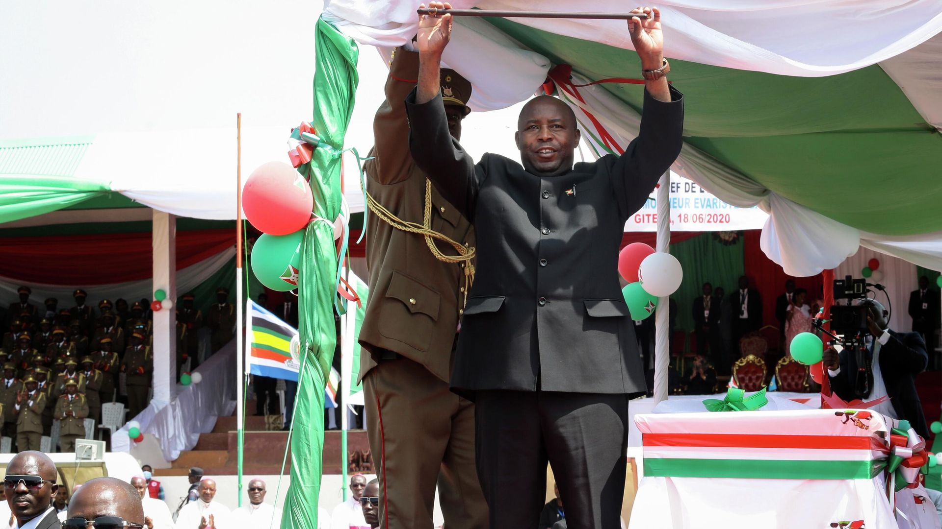 FILE - Burundi's President Evariste Ndayishimiye gestures to the crowd after his inauguration in Gitega, Burundi on June 18, 2020. Opposition leaders and human rights groups warned in Dec. 2021 that Burundi's government has shown little if any improvement under Ndayishimiye, who took office after the death of President Pierre Nkurunziza in 2020 with talk of reforms after years of deadly political crackdowns. FILE - Burundi's President Evariste Ndayishimiye gestures to the crowd after his inauguration in Gitega, Burundi on June 18, 2020. Opposition leaders and human rights groups warned in Dec. 2021 that Burundi's government has shown little if any improvement under Ndayishimiye, who took office after the death of President Pierre Nkurunziza in 2020 with talk of reforms after years of deadly political crackdowns. - Sputnik International, 1920, 08.09.2022