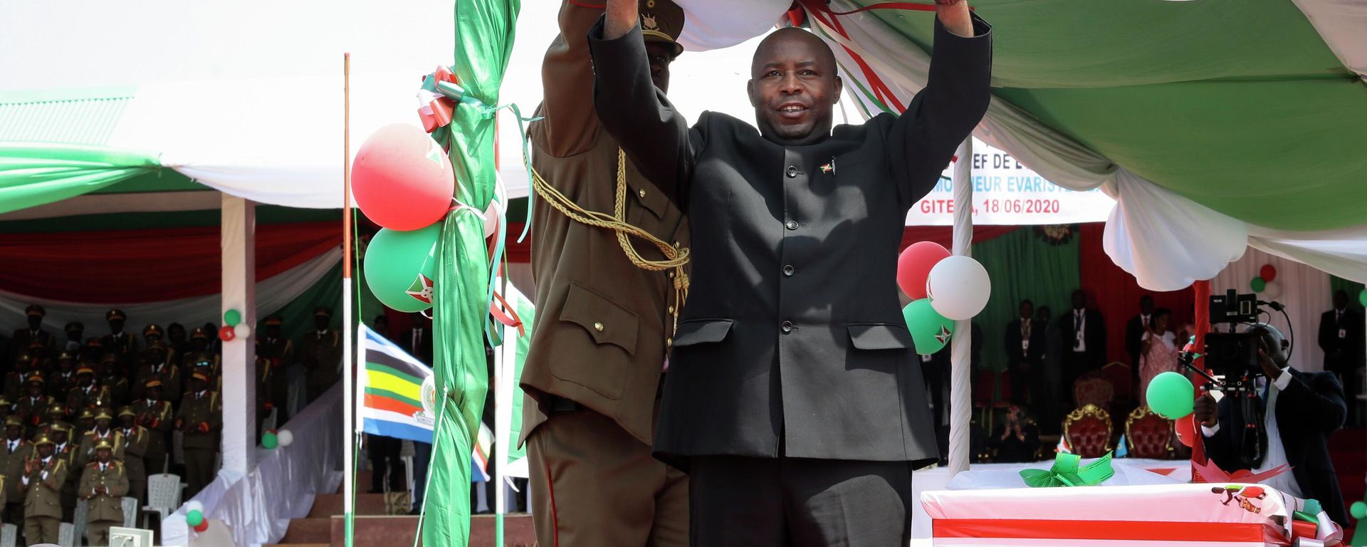 FILE - Burundi's President Evariste Ndayishimiye gestures to the crowd after his inauguration in Gitega, Burundi on June 18, 2020. Opposition leaders and human rights groups warned in Dec. 2021 that Burundi's government has shown little if any improvement under Ndayishimiye, who took office after the death of President Pierre Nkurunziza in 2020 with talk of reforms after years of deadly political crackdowns. FILE - Burundi's President Evariste Ndayishimiye gestures to the crowd after his inauguration in Gitega, Burundi on June 18, 2020. Opposition leaders and human rights groups warned in Dec. 2021 that Burundi's government has shown little if any improvement under Ndayishimiye, who took office after the death of President Pierre Nkurunziza in 2020 with talk of reforms after years of deadly political crackdowns. - Sputnik International, 1920, 08.09.2022