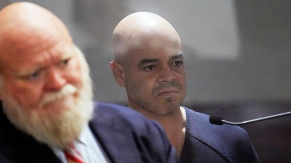 Clark County Public Administrator Robert Rob Telles, right, appears in court with attorney Travis E. Shetler, left, Thursday, Sept. 8, 2022, in Las Vegas. Telles was arrested Wednesday in the fatal stabbing of Las Vegas Review-Journal reporter Jeff German, whose investigations of the official's work preceded his primary loss in June. (AP Photo/John Locher) - Sputnik International
