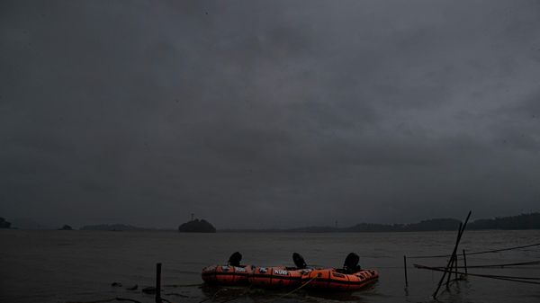 Rubber boats of National Disaster Response Force (NDRF) are kept ready for any emergency in the middle of heavy wind and rain in the river Brahmaputra in Gauhati, India, Thursday, May 21, 2020. A powerful cyclone ripped through densely populated coastal India and Bangladesh, blowing off roofs and whipping up waves that swallowed embankments and bridges and left entire villages without access to fresh water, electricity and communications. (AP Photo/Anupam Nath) - Sputnik International