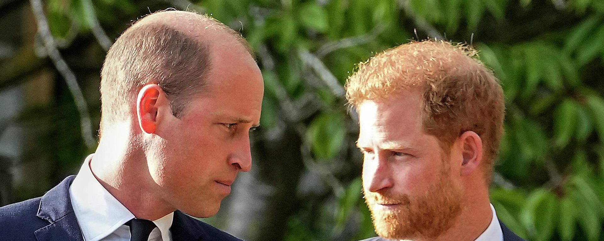 Britain's Prince William and Britain's Prince Harry walk beside each other after viewing the floral tributes for the late Queen Elizabeth II outside Windsor Castle - Sputnik International, 1920, 05.01.2023