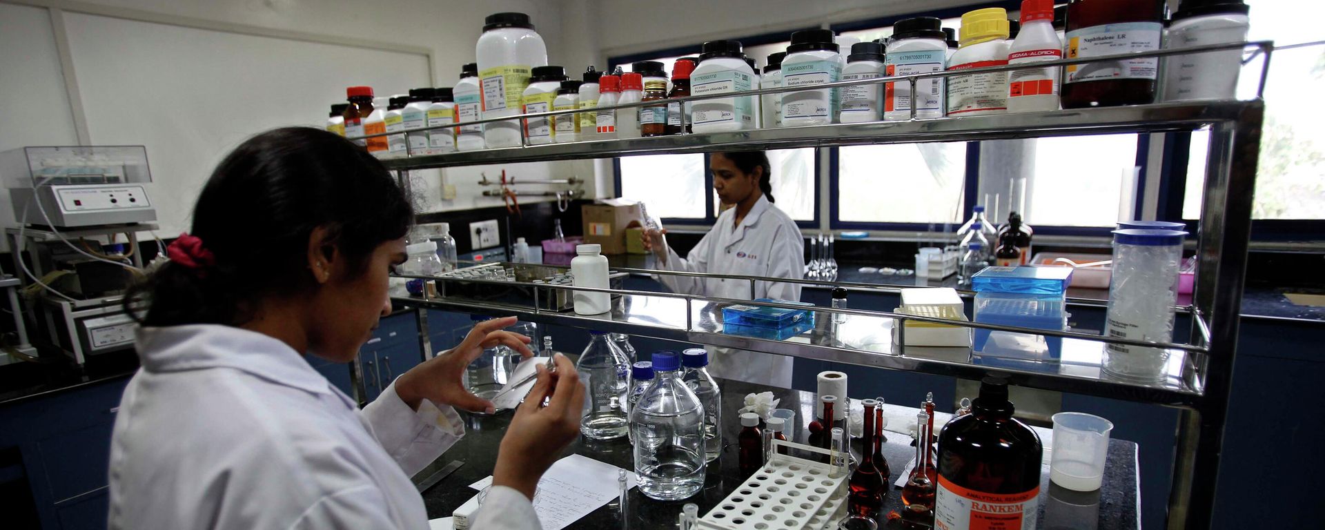 In this March 13, 2012 file photo, Indian scientists work inside a laboratory of the Research and Development Centre of Natco Pharma Ltd. in Hyderabad, India. In this March 13, 2012 file photo, Indian scientists work inside a laboratory of the Research and Development Centre of Natco Pharma Ltd. in Hyderabad, India. - Sputnik International, 1920, 15.09.2022