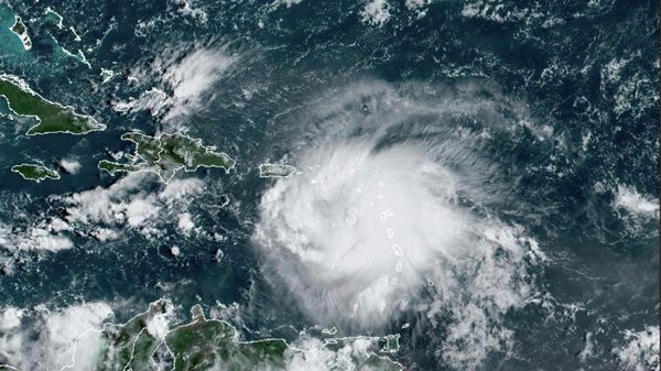 This satellite image provided by NOAA shows Tropical Storm Fiona in the Caribbean on Saturday, Sept. 17, 2022. Fiona threatened to dump up to 16 inches (41 centimeters) of rain in parts of Puerto Rico on Saturday as forecasters placed the U.S. territory under a hurricane watch and people braced for potential landslides, severe flooding and power outages.  - Sputnik International