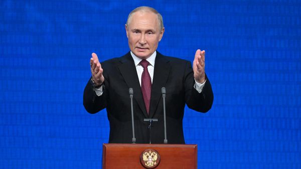 Russian President Vladimir Putin addresses an event marking the 100th anniversary of the republic of Adygea, Kabardino-Balkaria and Karachayevo-Circasia, at the State Kremlin Palace in Moscow, Russia  - Sputnik International