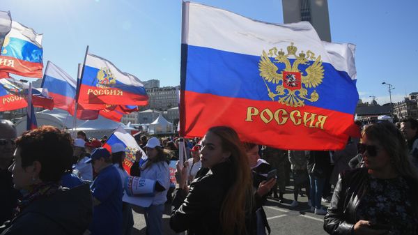 Акция во Владивостоке в поддержку жителей освобожденных территорий Донбасса и Украины, где проводится референдум о вступлении в состав Российской Федерации - Sputnik International