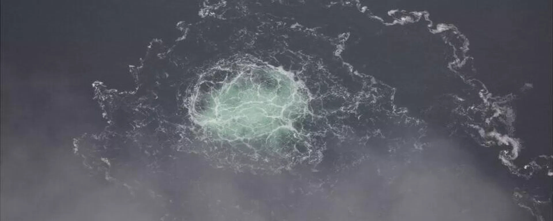 In this picture provided by Swedish Coast Guard, a small release from Nord Stream 2 is seen, Wednesday, Sept. 28, 2022 - Sputnik International, 1920, 14.10.2026