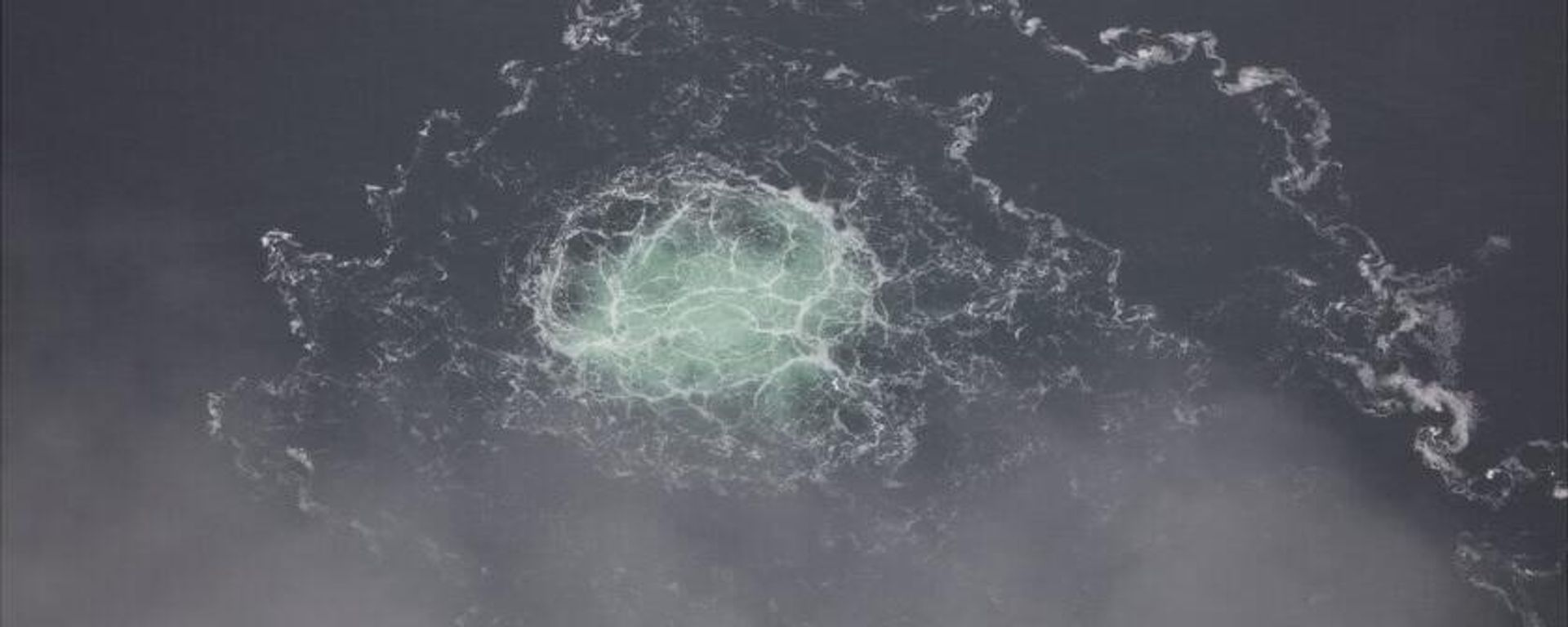 In this picture provided by Swedish Coast Guard, a small release from Nord Stream 2 is seen, Wednesday, Sept. 28, 2022 - Sputnik International, 1920, 20.11.2024