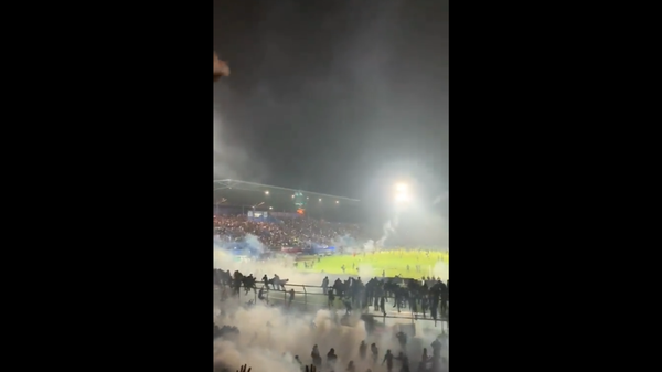 Image captures aftermath of a massive riot that broke out at the end of a match between Arema FC and Persebaya Surabaya at the Kanjuruhan Stadium in Malang, Indonesia. At least 127 are believed dead and 180 others injured. - Sputnik International