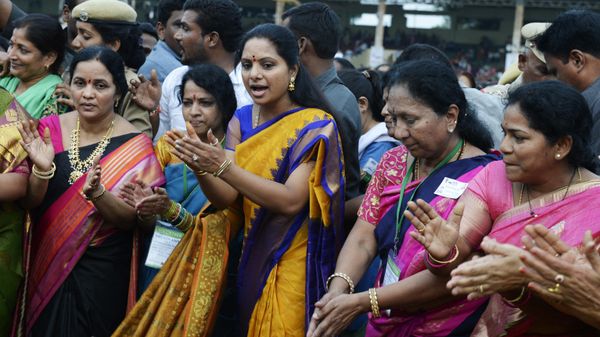 Member of Indian Parliament (MP)  K.Kavitha (3L) along with Hindu women perform rituals with floral displays as they celebrate the 'Bathukamma' or 'life giver' festival in Hyderabad on September 26, 2017. - Sputnik International