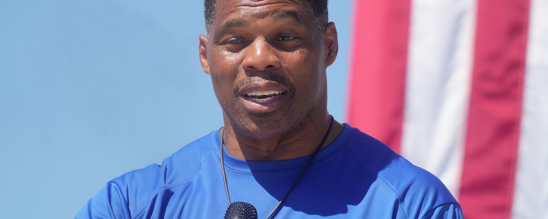Georgia GOP Senate nominee Herschel Walker smiles during remarks during a campaign stop at Battle Lumber Co. on Thursday, Oct. 6, 2022, in Wadley, Ga. Walker's appearance was his first following reports that a woman who said Walker paid for her 2009 abortion is actually mother of one of his children - undercutting Walker's claims he didn't know who she was. Georgia GOP Senate nominee Herschel Walker smiles during remarks during a campaign stop at Battle Lumber Co. on Thursday, Oct. 6, 2022, in Wadley, Ga. Walker's appearance was his first following reports that a woman who said Walker paid for her 2009 abortion is actually mother of one of his children - undercutting Walker's claims he didn't know who she was. - Sputnik International, 1920, 23.11.2022