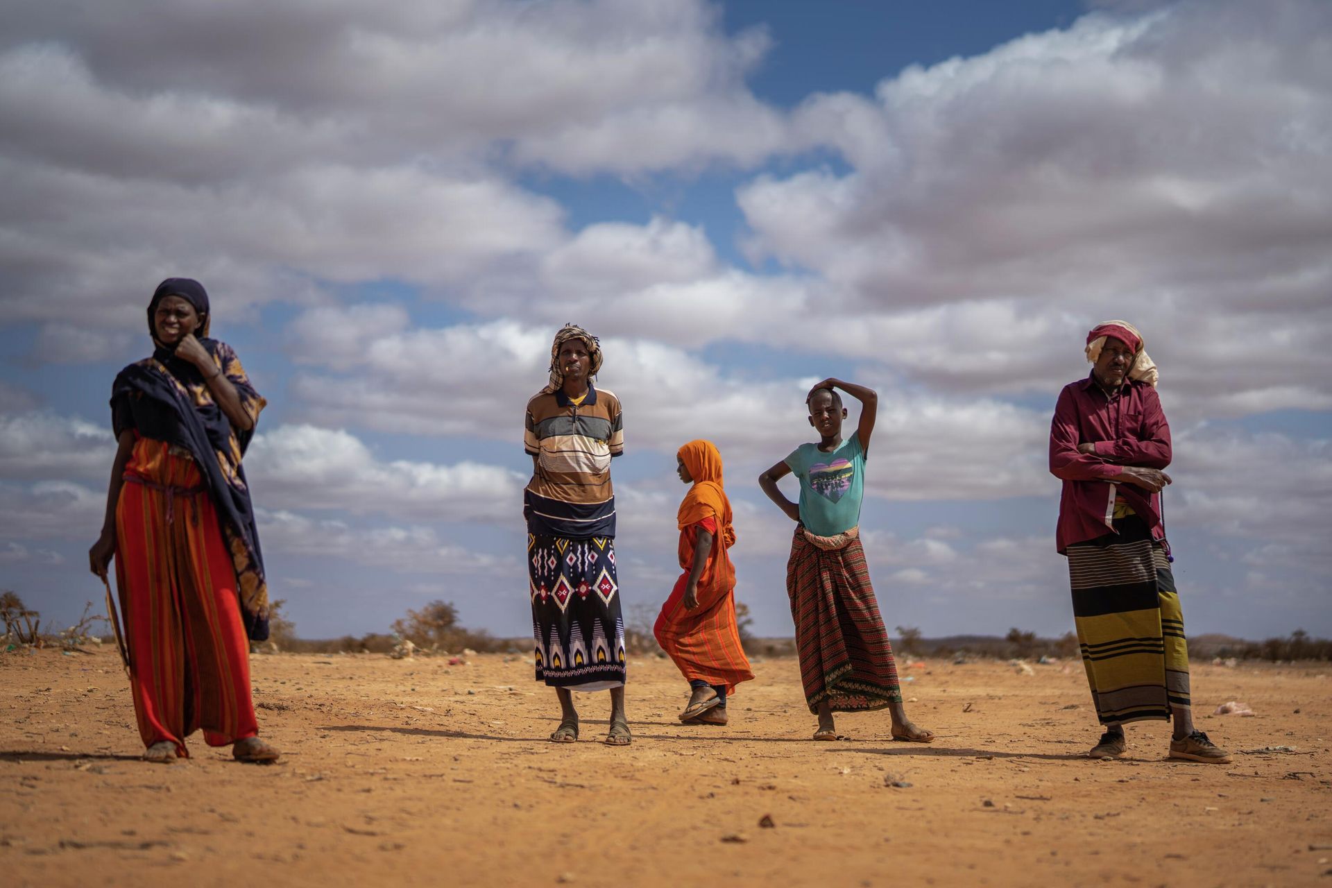 Men and women stand at a camp for displaced people on the outskirts of Dollow, Somalia, on Monday, Sept. 19, 2022. - Sputnik International, 1920, 14.10.2022