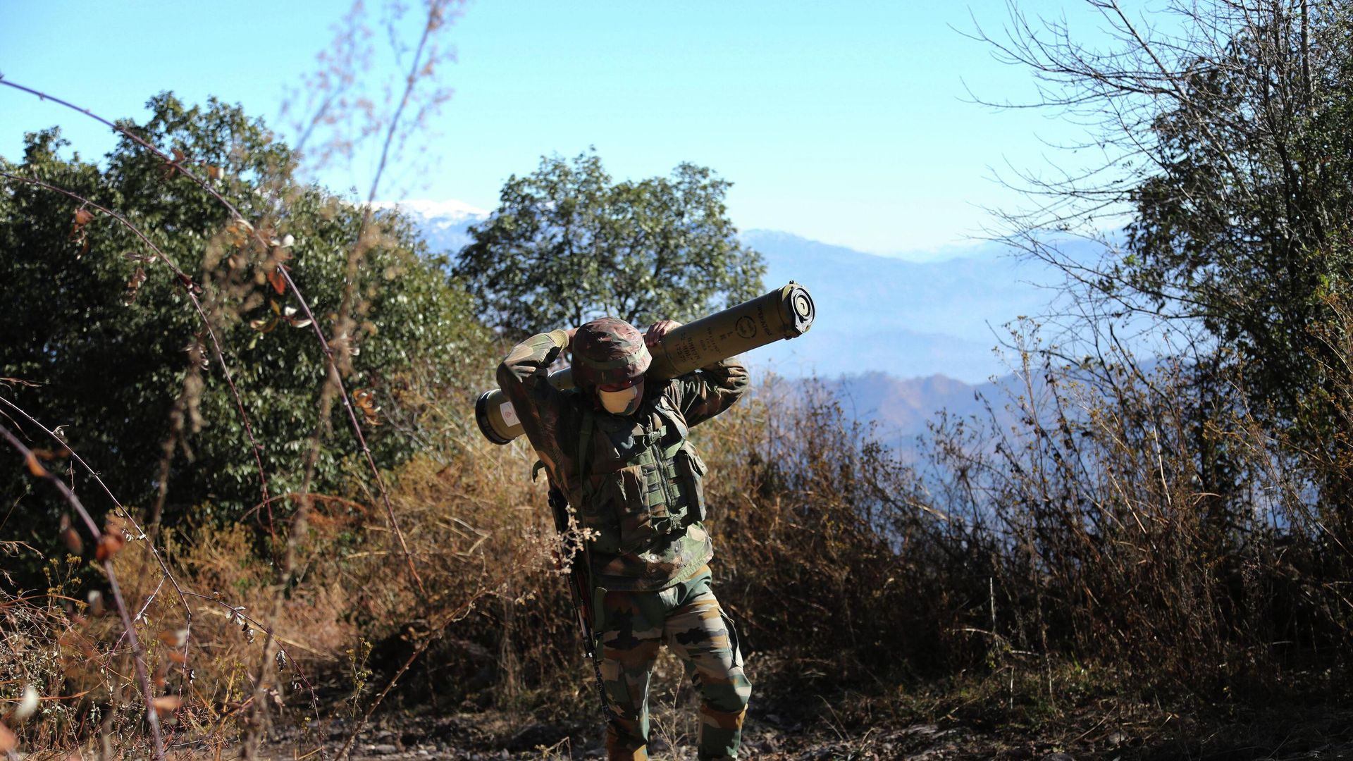 In this Dec.18, 2020, file photo, an Indian army soldier carries an anti-tank guided missile (ATGM) to his base between India and Pakistan border on the forward post of Balakot, in Poonch, about 250 kilometers (156 miles) from Jammu, India. - Sputnik International, 1920, 03.11.2022