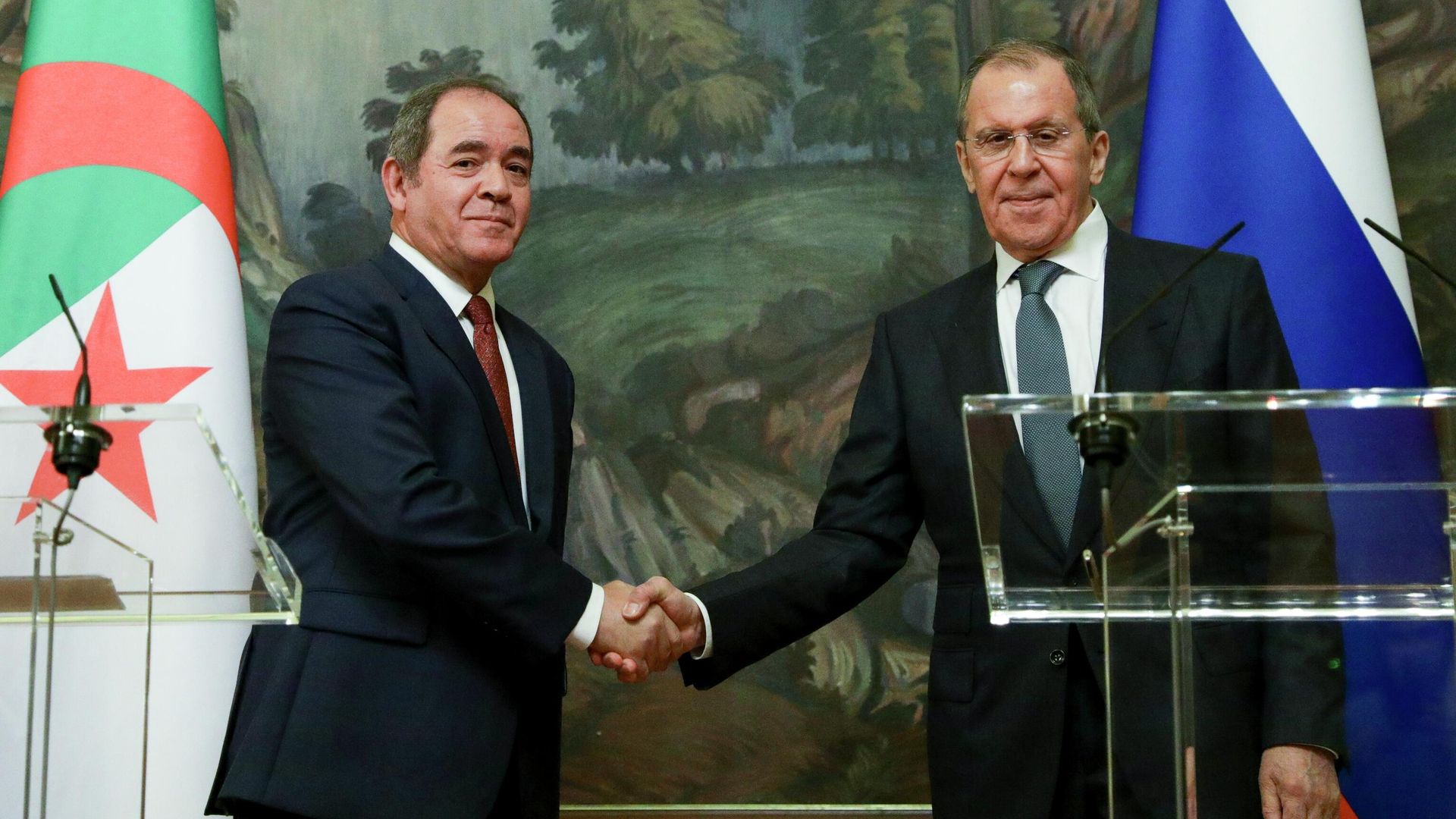 In this photo distributed by Russian Foreign Ministry Press Service, Russian Foreign Minister Sergey Lavrov, right, and Algerian Foreign Minister Sabri Boukadoum shake hands as they leave a joint news conference following their talks in Moscow, Russia on Wednesday, July 22, 2020. In this photo distributed by Russian Foreign Ministry Press Service, Russian Foreign Minister Sergey Lavrov, right, and Algerian Foreign Minister Sabri Boukadoum shake hands as they leave a joint news conference following their talks in Moscow, Russia on Wednesday, July 22, 2020. - Sputnik International, 1920, 10.10.2022