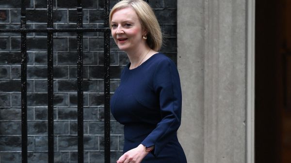 Britain's Prime Minister Liz Truss walks out of Number 10 Downing Street on her way to the House of Commons for the government's anti-inflation budget plan in London on September 23, 2022 - Sputnik International