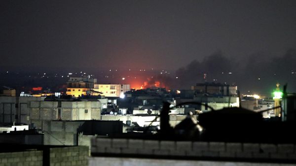 Smoke billows from an area of battles between rival Syrian factions competing for power in northwest Syria in the opposition-held town of Al-Bab, near the border with Turkey in the northern Aleppo province, on October 14, 2022. - Sputnik International