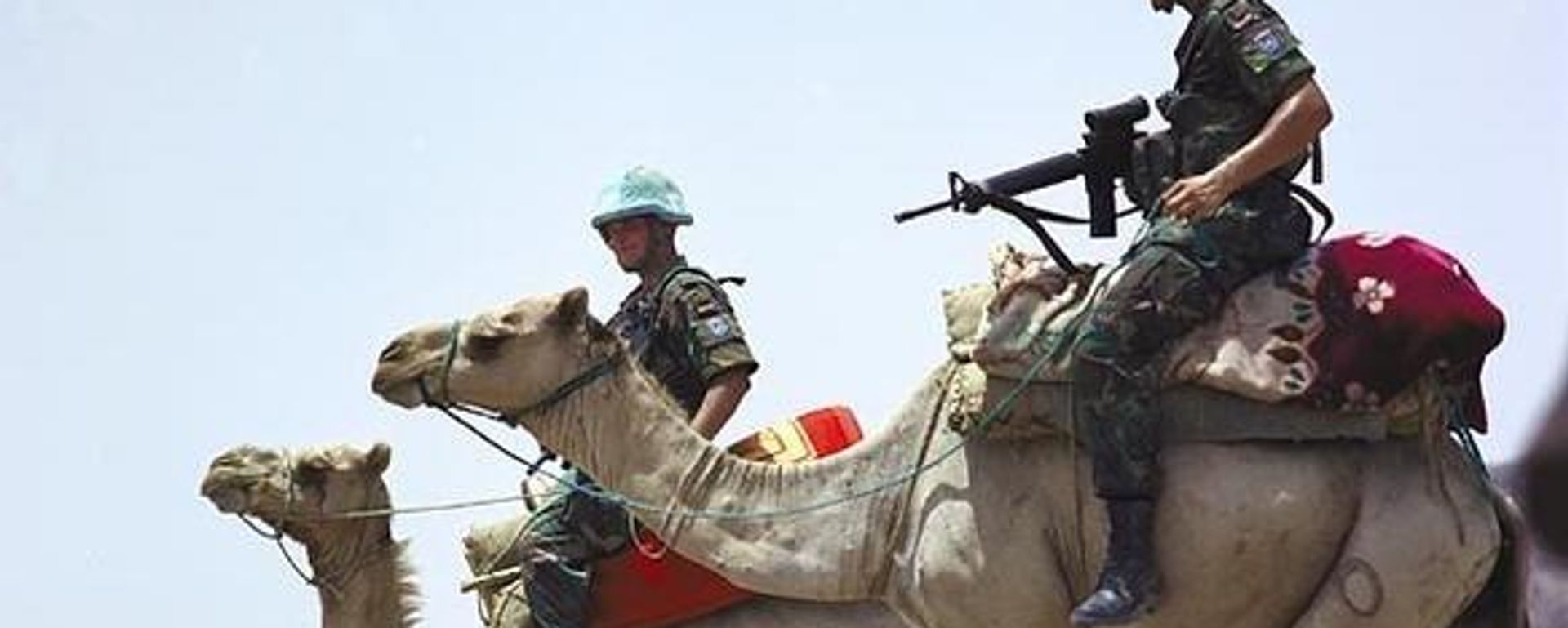UN soldiers on camel-back in Eritrea during the 2000-2008 peacekeeping mission monitoring the border between Eritrea and Ethiopia. UN soldiers on camel-back in Eritrea during the 2000-2008 peacekeeping mission monitoring the border between Eritrea and Ethiopia. - Sputnik International, 1920, 18.10.2022