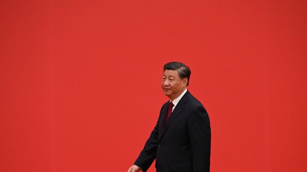 China's President Xi Jinping walks ahead of members of the Chinese Communist Party's new Politburo Standing Committee, the nation's top decision-making body, as they meet the media in the Great Hall of the People in Beijing on October 23, 2022.  - Sputnik International