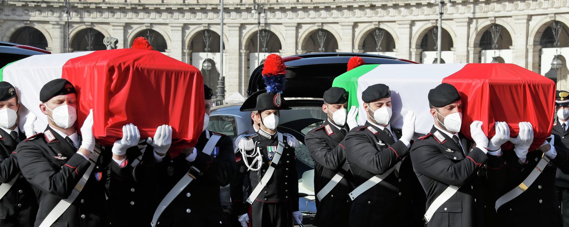 The coffins of the Italian ambassador to the Democratic Republic of Congo Luca Attanasio, right, and Italian Carabinieri police officer Vittorio Iacovacci are draped with the Italian flag ahead of their state funeral in Santa Maria degli Angeli church, in Rome, Thursday, Feb. 25, 2021. The coffins of the Italian ambassador to the Democratic Republic of Congo Luca Attanasio, right, and Italian Carabinieri police officer Vittorio Iacovacci are draped with the Italian flag ahead of their state funeral in Santa Maria degli Angeli church, in Rome, Thursday, Feb. 25, 2021. - Sputnik International, 1920, 26.10.2022