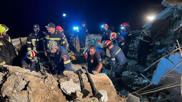 Firemen search in debris after a landslide in Agia Fotia, near Koutsounari, southeastern Crete, on October 30, 2022. - A 45-year-old tourist from the Czech Republic was killed in a landslide on the building where she was staying on the Greek island of Crete overnight from Saturday to Sunday. Her son and husband were found alive in the rubble in Agia Fotia, in southeastern Crete, Greece's largest island. (Photo by Jason Tavlas / AFP) - Sputnik International