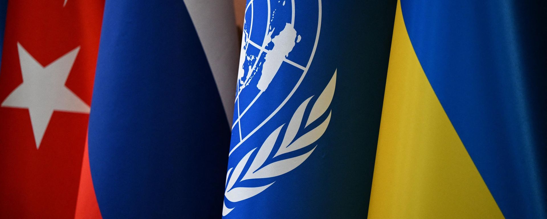 This photograph taken on July 22, 2022, shows a Turkish national flag, a Russian national flag, a United Nations (UN) flag and a Ukrainian national flag in Istanbul before the signature ceremony of an initiative on the safe transportation of grain and foodstuffs from Ukrainian ports. This photograph taken on July 22, 2022, shows a Turkish national flag, a Russian national flag, a United Nations (UN) flag and a Ukrainian national flag in Istanbul before the signature ceremony of an initiative on the safe transportation of grain and foodstuffs from Ukrainian ports. - Sputnik International, 1920, 30.10.2022