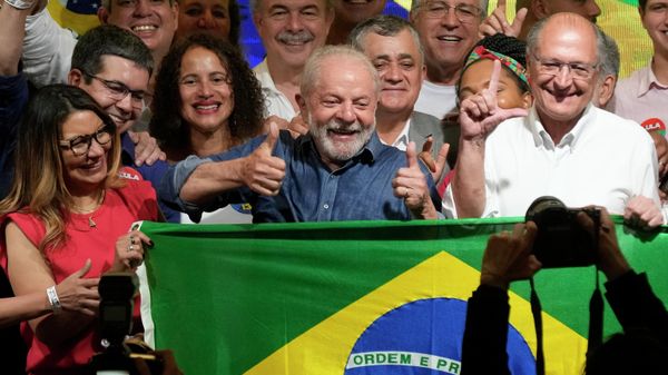Former Brazilian President Luiz Inacio Lula da Silva celebrates with his wife Rosangela Silva, left, and running mate Geraldo Alckmin, right, after defeating incumbent Jair Bolsonaro in a presidential run-off to become the country's next president, in Sao Paulo, Brazil, Sunday, Oct. 30, 2022. - Sputnik International