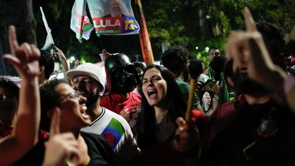 Supporters of former Brazilian President Luiz Inacio Lula da Silva celebrate after defeating incumbent Jair Bolsonaro in a presidential run-off to become the country's next president, in Sao Paulo, Brazil, Sunday, Oct. 30, 2022.  - Sputnik International