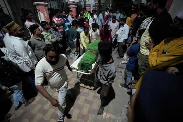 Volunteers and health workers carry a victim after a cable bridge across the Machchu River collapsed in Morbi, a town in the Indian state Gujarat, on Monday, October 31, 2022. Dozens are dead and many are feared injured in the accident. - Sputnik International