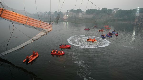 Search and rescue work is going on as a cable suspension bridge collapsed in Morbi town of western state Gujarat, India, Monday, Oct. 31, 2022. - Sputnik International